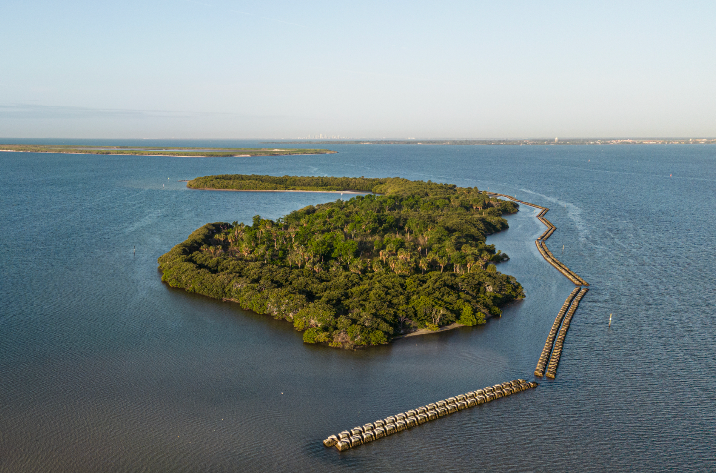 An aerial view of a living shoreline around an island